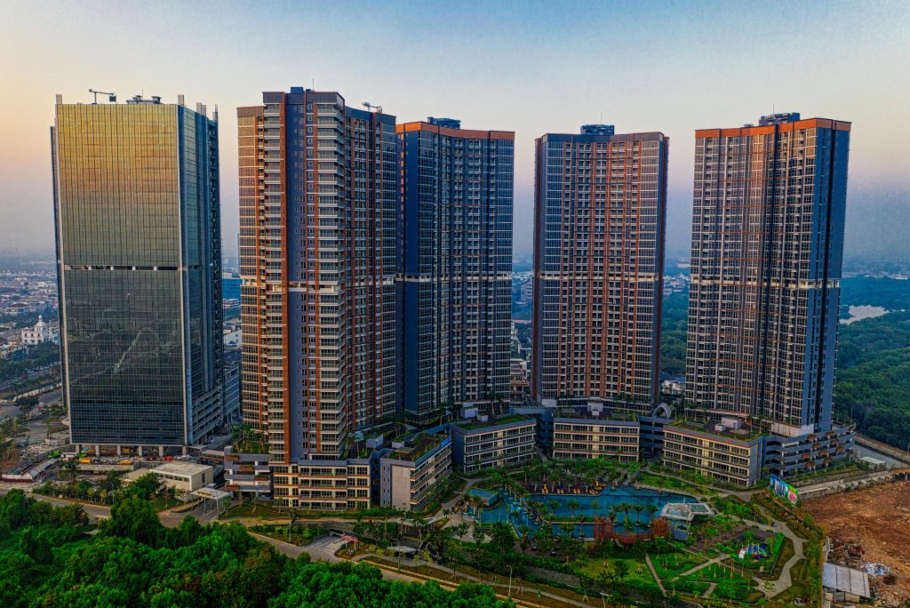 Stunning aerial shot of towering skyscrapers in Jakarta against a vibrant sky.